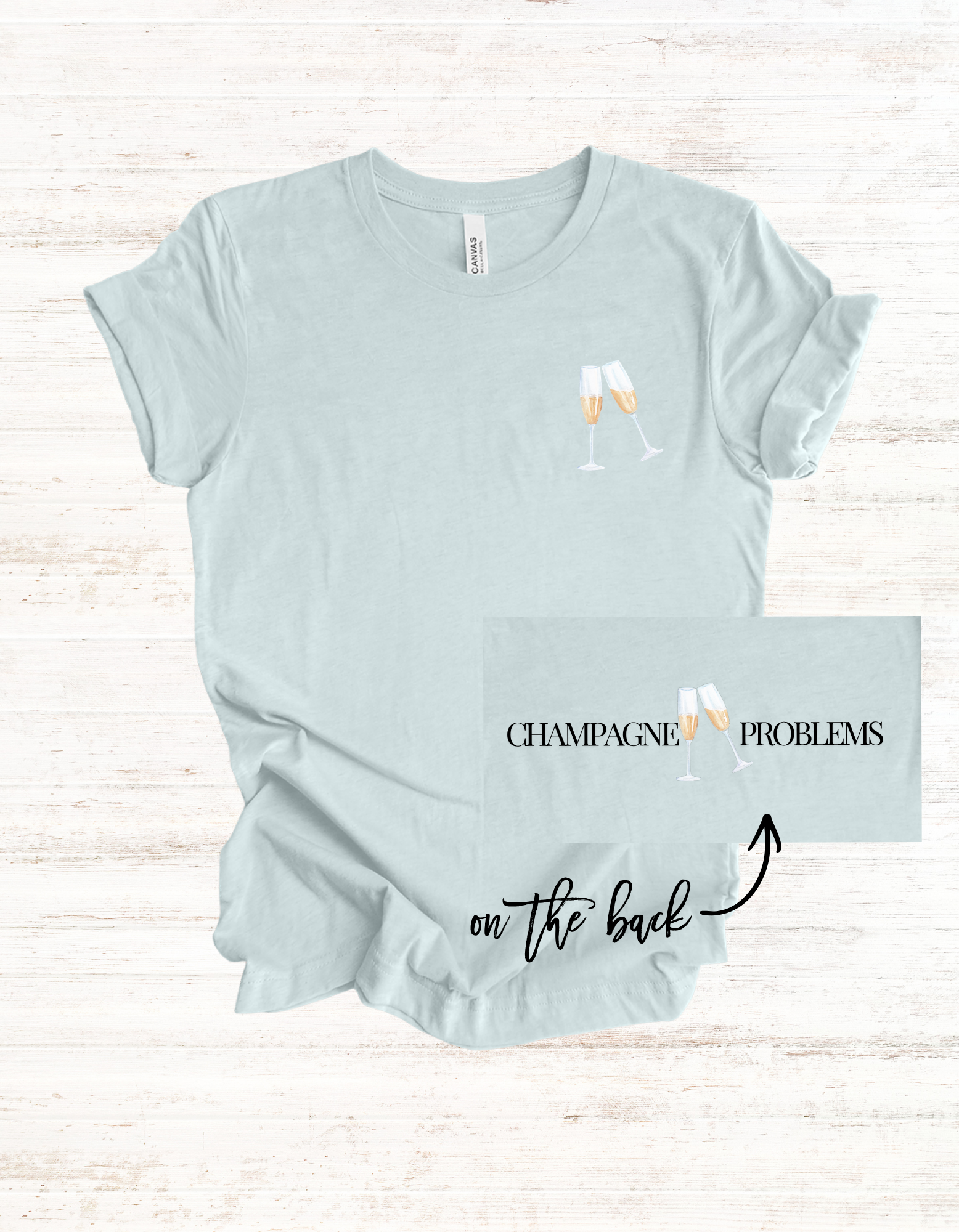 Champagne Problems tee | Champagne glass chest logo, text back
