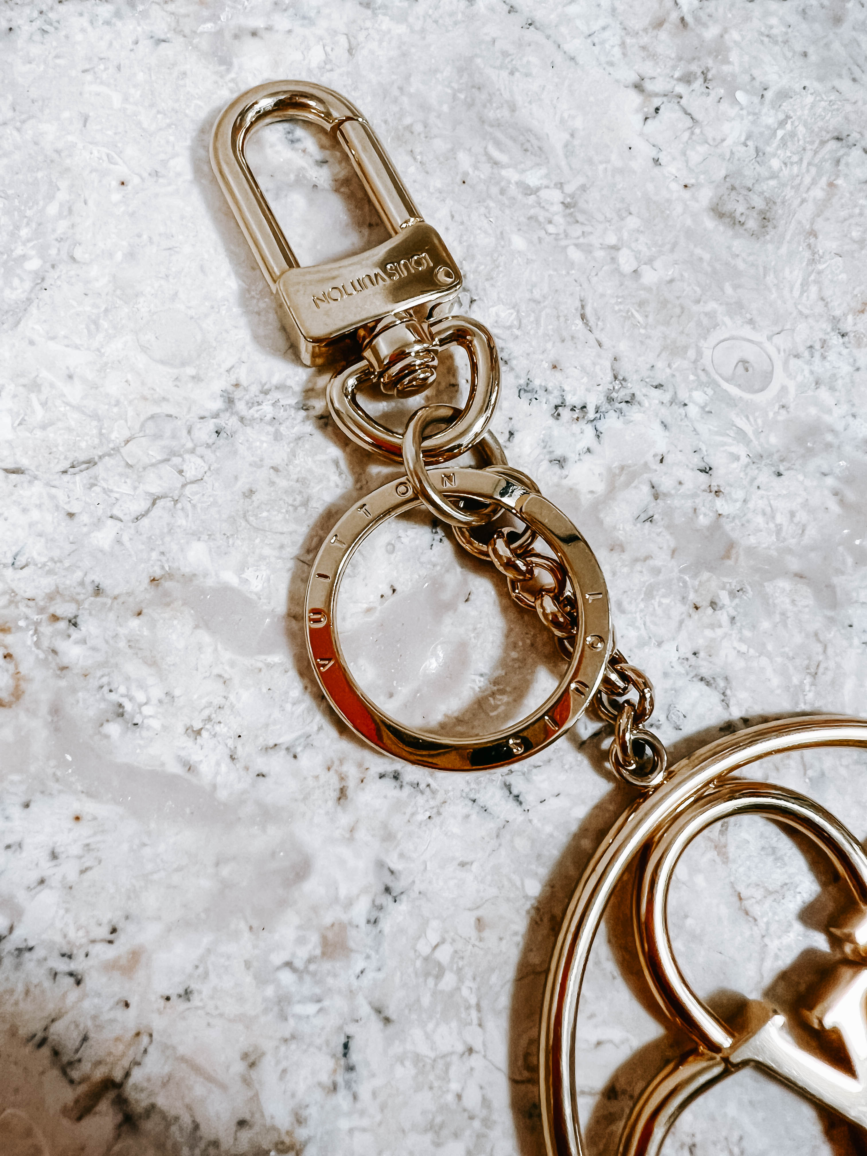 Pre-Owned LV Brass Keychain Porte Cle Flower Bag Charm