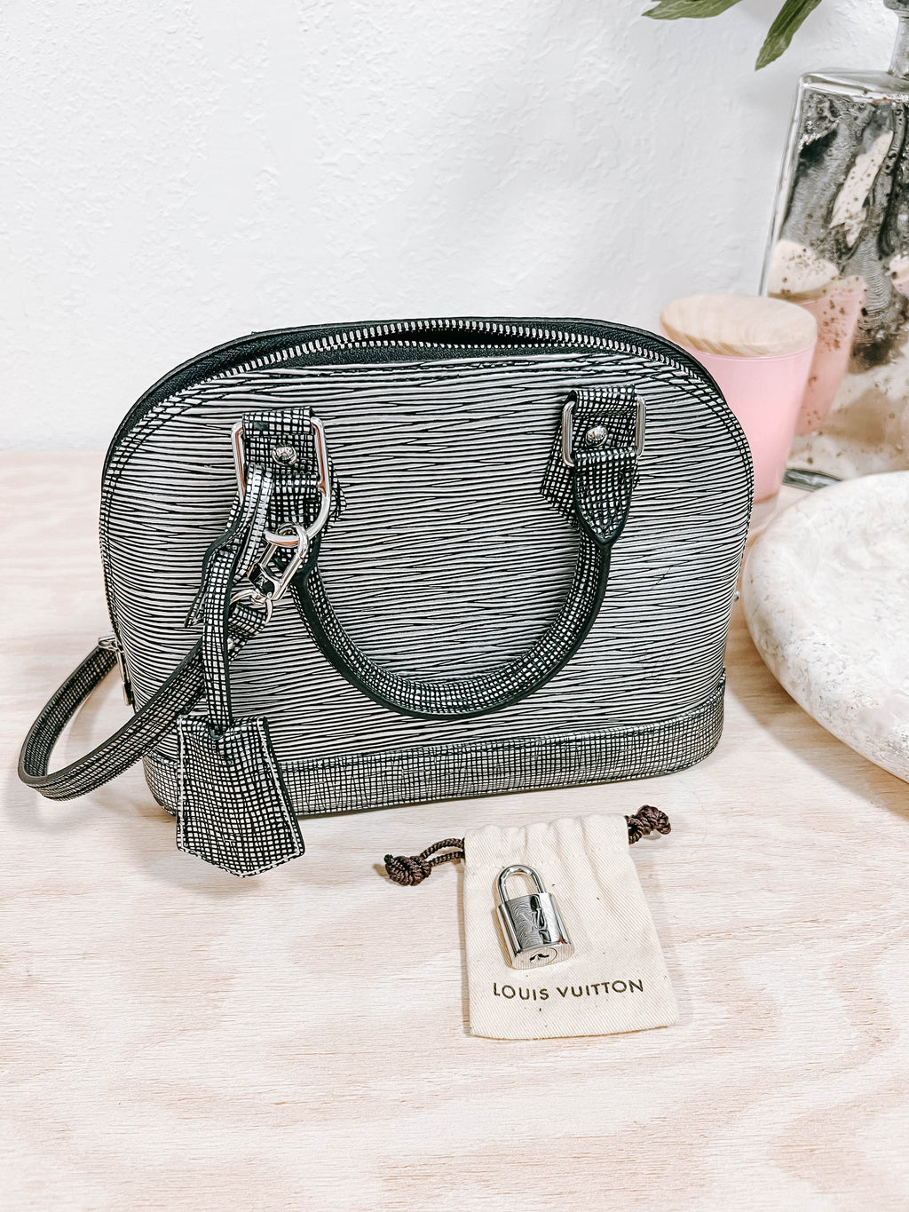Pre-Owned LV Epi Alma Platine BB