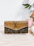Pre-Owned Louis Vuitton Jumbo Reverse Monogram Sarah Wallet