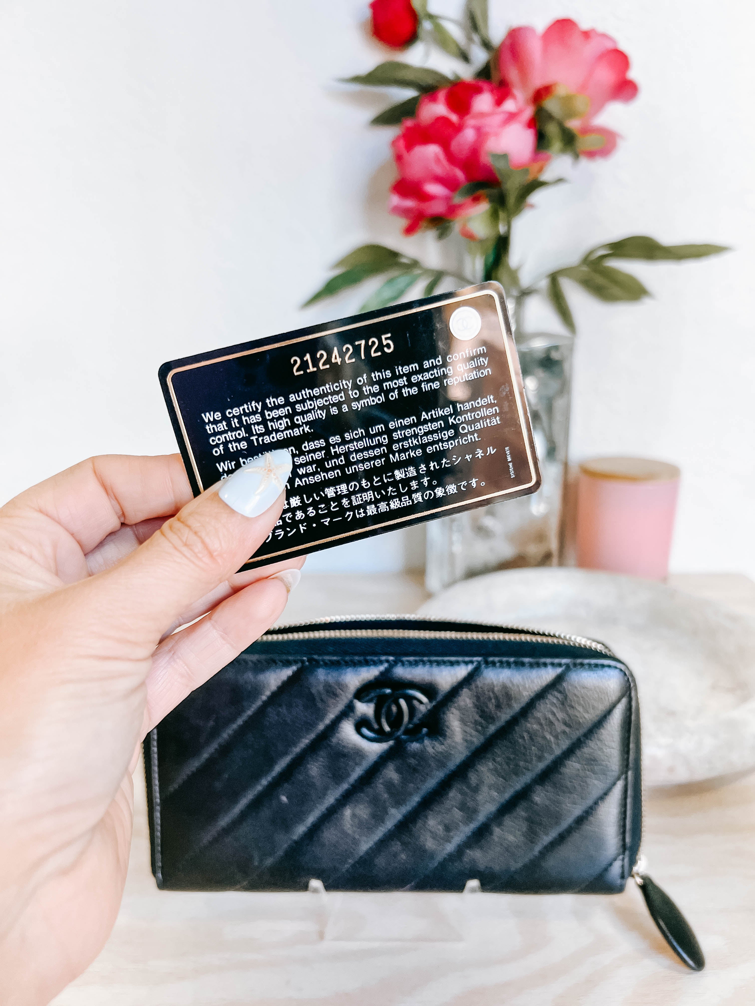 Pre-Owned Chanel Black Lambskin Zippy Wallet *Final Sale*